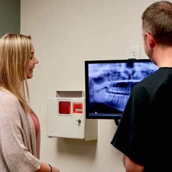 Patient reviewing X-ray with OMS