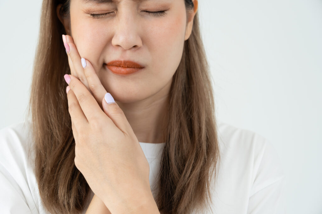 Asian woman feel toothache from gingivitis, female suffer tooth, decay problems, dental care. sensitive tooth, decay problem, bad breath, Gingival Recession, Oral Hygiene instruction, tooth extraction