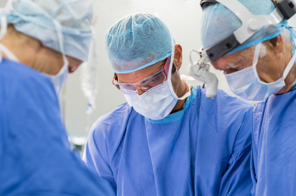Team of surgeons operating