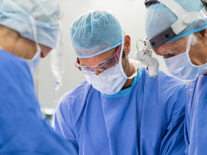 Team of surgeons operating