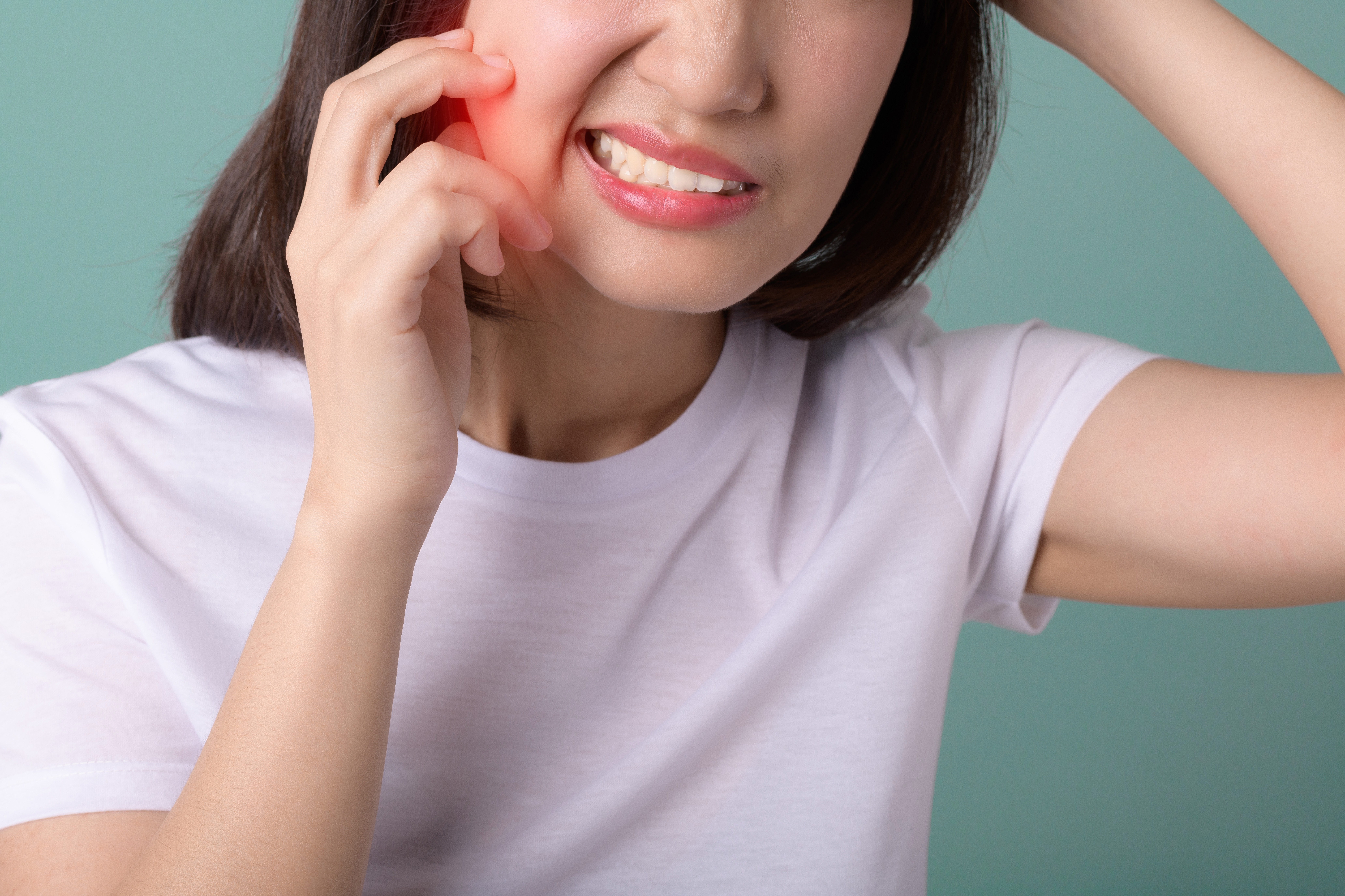Toothache,Jaw,Pain.,Asian,Young,Woman,Touching,Her,Mouth,,Expression,