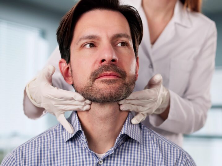 The,Doctor,Carefully,Palpates,The,Thyroid,Gland,During,Physical,Exam